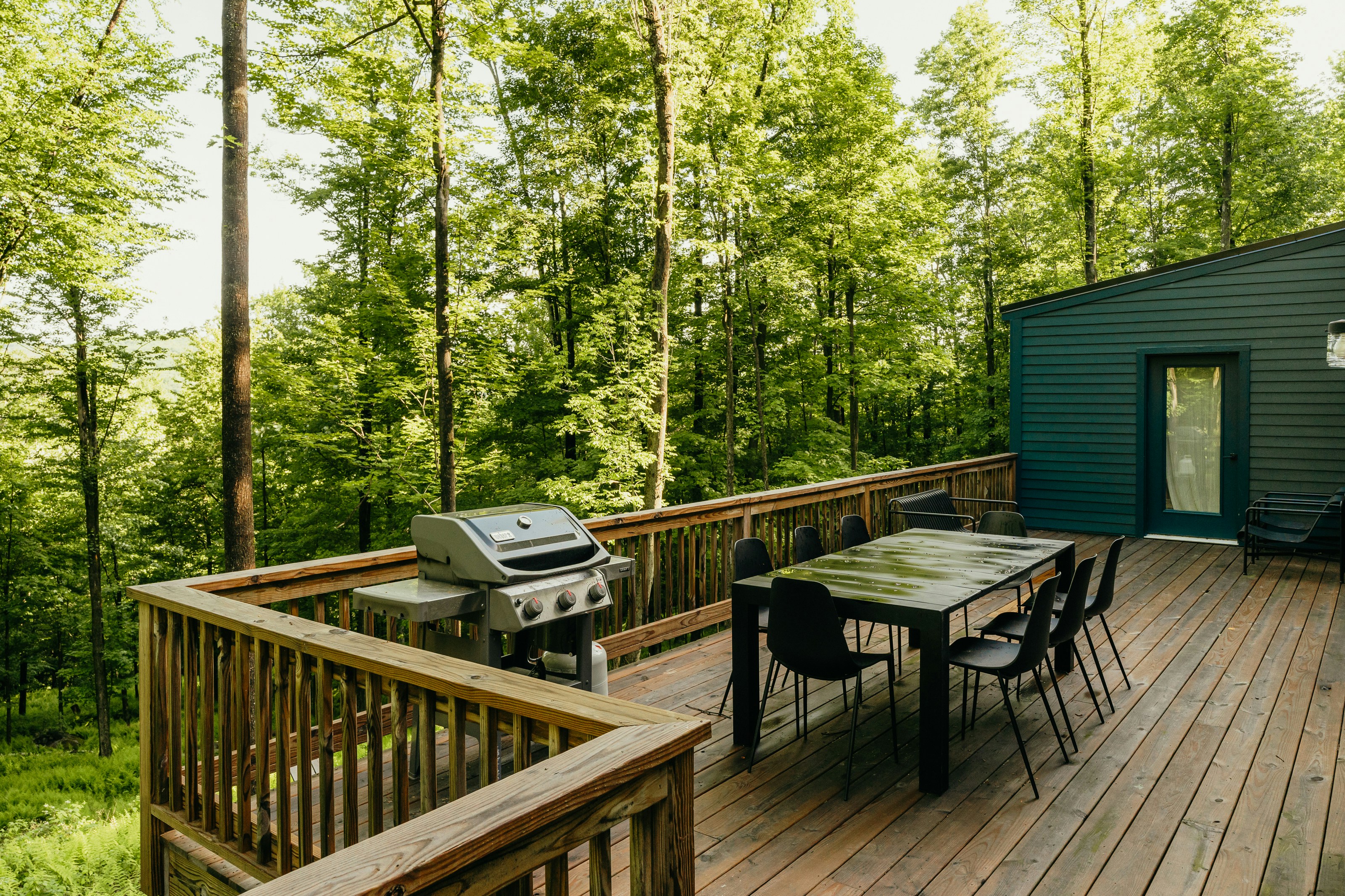 picture of a deck on a house covered with vinyl